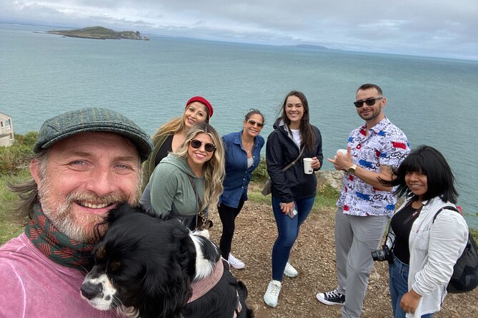 Dublin Coastal Hike, Pints & Puppies Adventure - Martello tower stop with vintage radios, then the big Howth Head climb