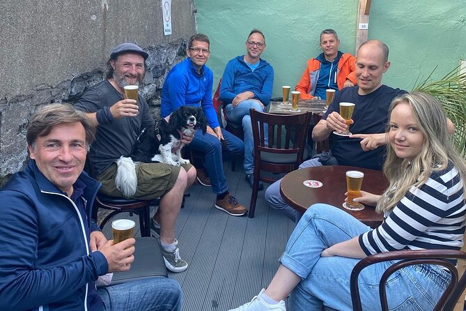Dublin Coastal Hike, Pints & Puppies Adventure - The Bloody Stream finish: pint reward, puppy cameo, and the souvenir video