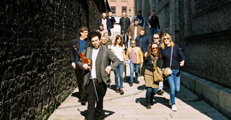 Dublin: Irish Music Walking Tour with Live Performance - Entering The Old Storehouse start point and getting in the groove fast