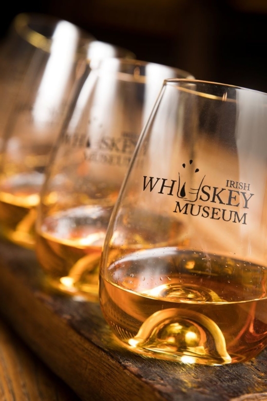 Dublin: Irish Whiskey Museum Tour and Whiskey Tasting - Four rooms of Irish whiskey history, from Gaelic roots to revival