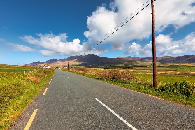 Personalized Full-Day Dingle Peninsula and Slea Head Drive Tour - Stop 1: Inch Beach for dunes, wind, and a Blue Flag view