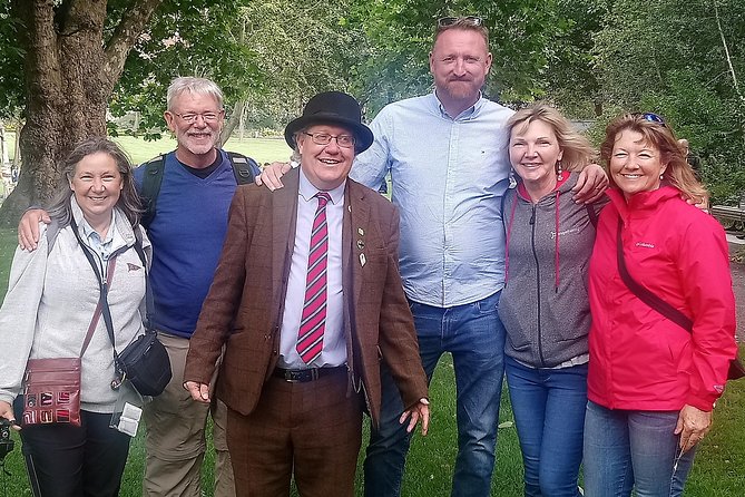 Walking tour in Merrion Square Park with a pint of Guinness Dublin Rogues Tour - Stop 1 at Merrion Square West: The Main Walk and Its Best Moments